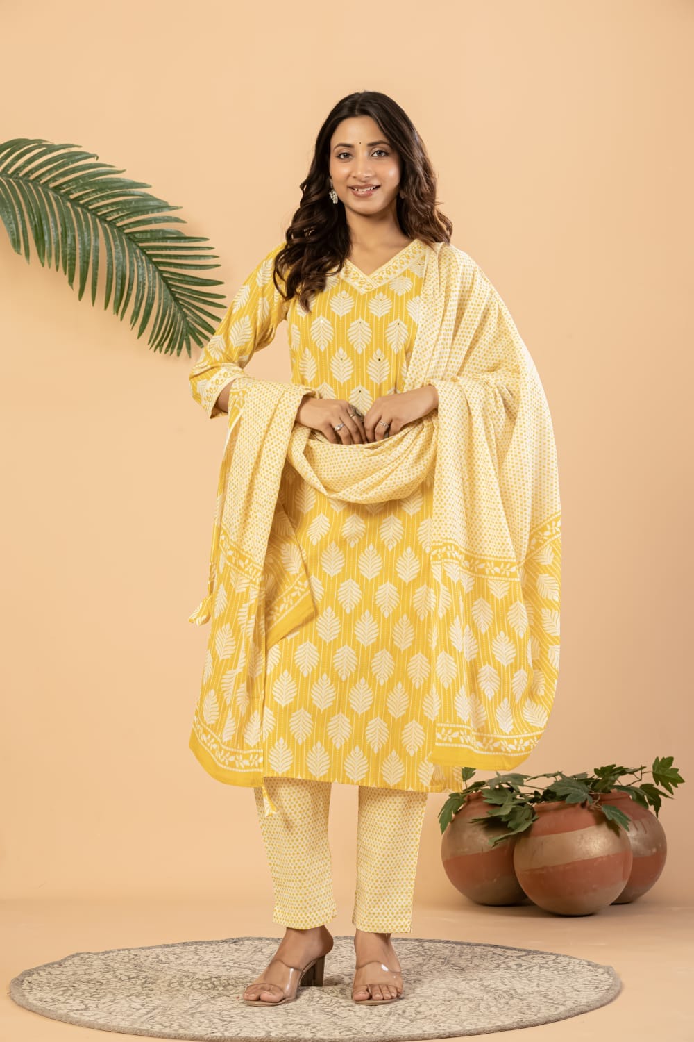 Women leaf printed pure cotton straight kurta set with v neck lace border and matching pants by The Kurti Shop