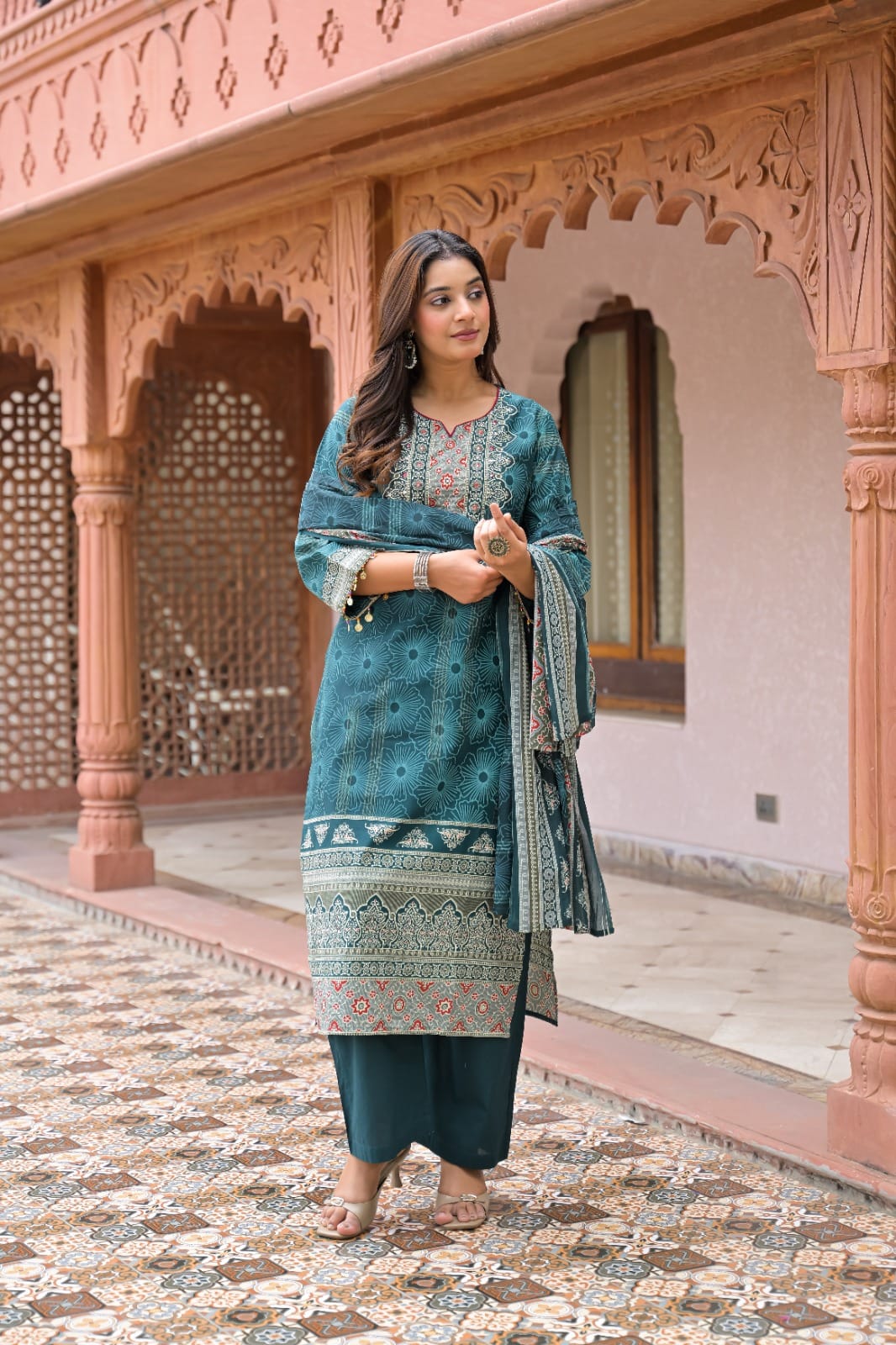 Trending 3-piece cotton kurti set with embroidered yoke, straight pants, and printed dupatta by The Kurti Shop.