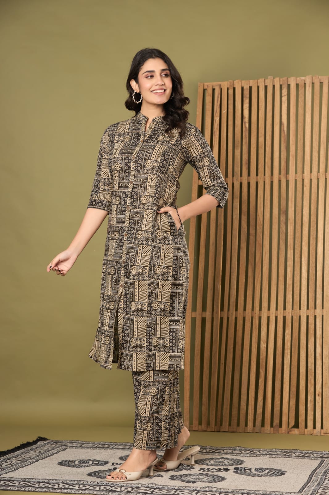the kurti shop, women cotton kurti set, printed kurta pant set, kurti with pocket, black geometric print kurti, mandarin collar kurta set, office wear ethnic set, 3/4 sleeve straight kurti, ladies kurta pant set, traditional cotton dress, festive daily wear kurti, ethnic trousers combo set, ready to wear kurti pant
