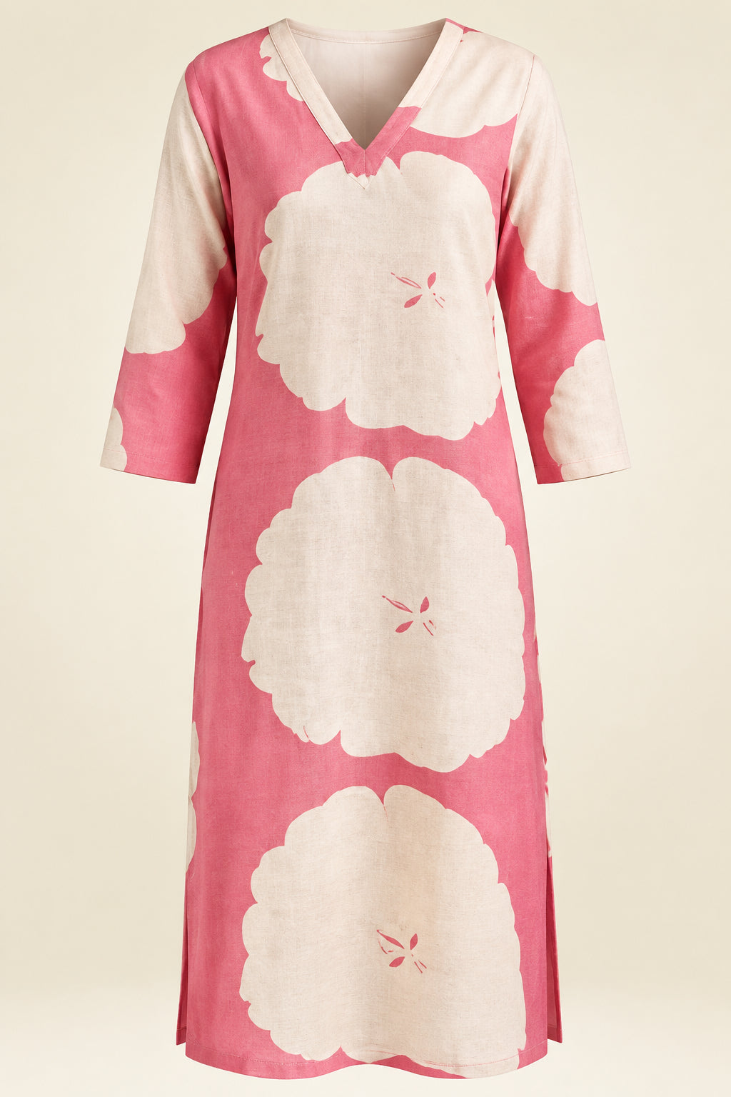 A collage showing a pink and off-white abstract floral kurta from multiple angles, with text labels highlighting features like v-neckline, full frontal/rear presentation, sleeve cuff detail, side slit, and premium fabric texture. A model is visible in some panels, but the overall layout functions as a product feature collage rather than a single lifestyle scene.