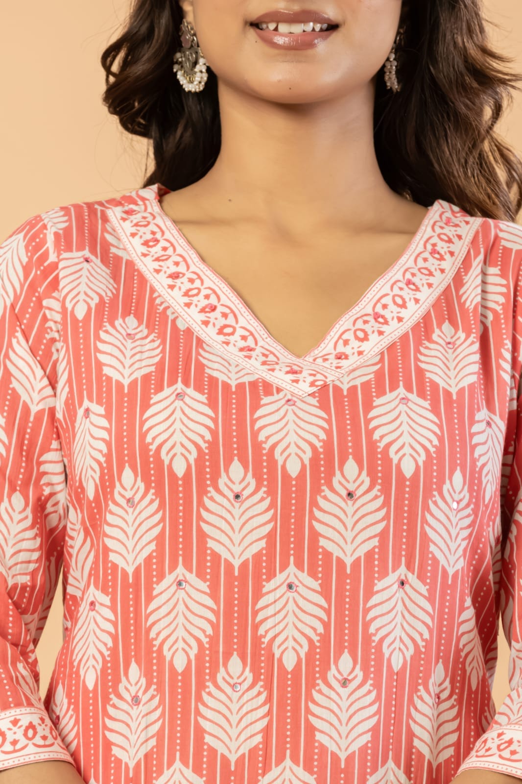 Stylish v neck cotton kurta with lace embroidery and matching trousers for women