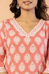 Stylish v neck cotton kurta with lace embroidery and matching trousers for women