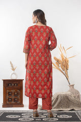 Women's printed straight kurti paired with trousers and patterned dupatta.   