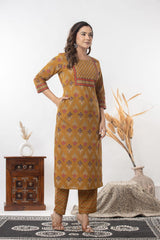 Designer ethnic printed kurti with trousers and matching dupatta.