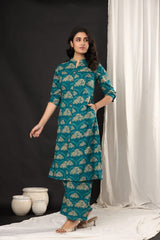The Kurti Shop, the kurti shop kurta set, the kurti shop suits, teal blue kurti, teal green kurti set, cotton printed kurta set, women floral kurti palazzo set, mandarin collar kurti, front button straight kurta, office wear kurti, ethnic suit set for women, daily wear kurti set, printed co-ord set women, indian ethnic wear, summer cotton suit set, womens stylish kurti, traditional kurti pants set, latest kurti design 2026, branded suit set for women, pure cotton readymade suit, ladies ethnic outfit, stylis