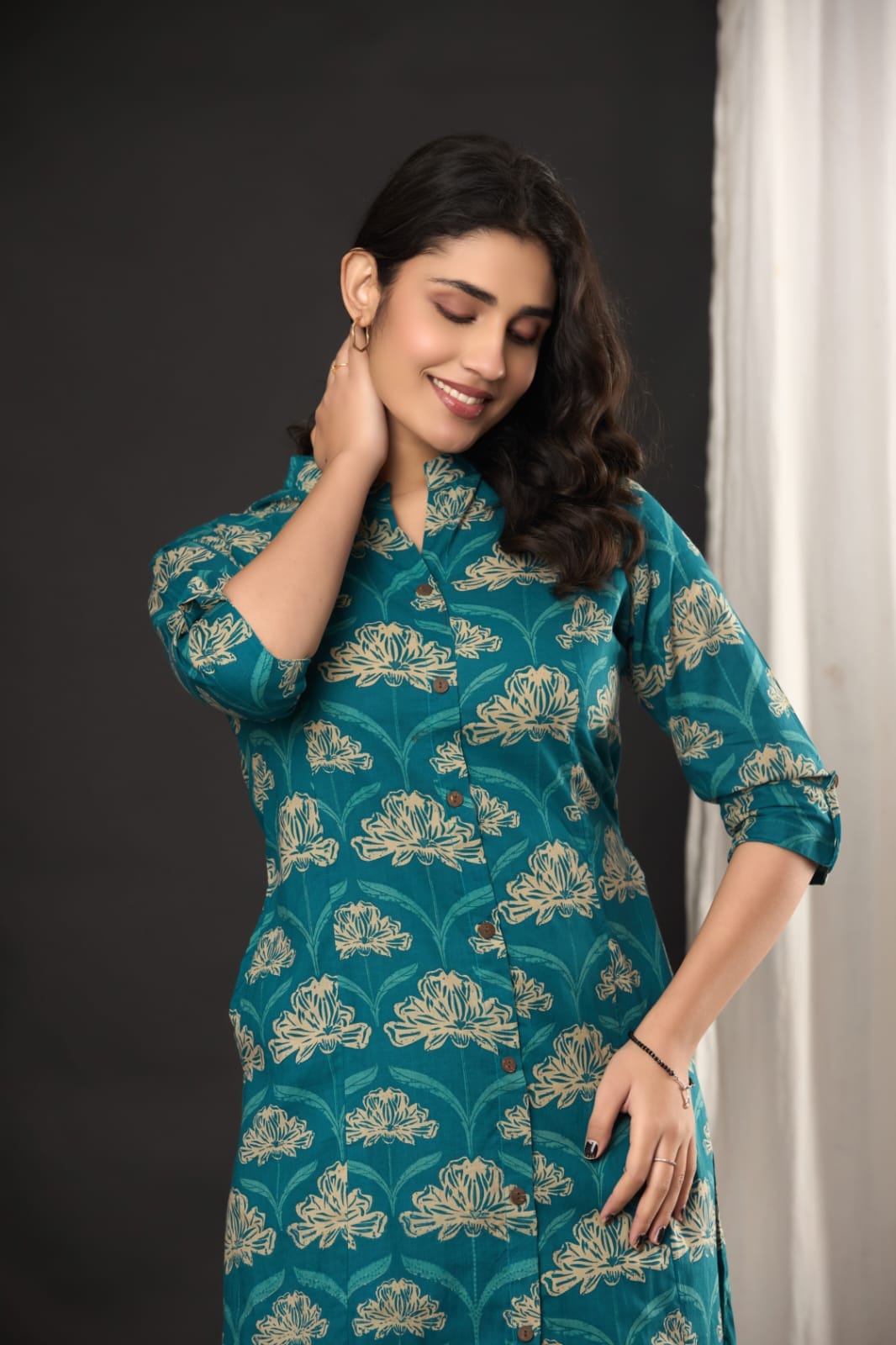 The Kurti Shop, the kurti shop kurta set, the kurti shop suits, teal blue kurti, teal green kurti set, cotton printed kurta set, women floral kurti palazzo set, mandarin collar kurti, front button straight kurta, office wear kurti, ethnic suit set for women, daily wear kurti set, printed co-ord set women, indian ethnic wear, summer cotton suit set, womens stylish kurti, traditional kurti pants set, latest kurti design 2026, branded suit set for women, pure cotton readymade suit, ladies ethnic outfit, stylis