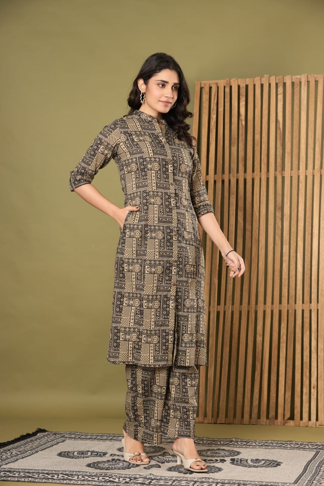 the kurti shop, women cotton kurti set, printed kurta pant set, kurti with pocket, black geometric print kurti, mandarin collar kurta set, office wear ethnic set, 3/4 sleeve straight kurti, ladies kurta pant set, traditional cotton dress, festive daily wear kurti, ethnic trousers combo set, ready to wear kurti pant