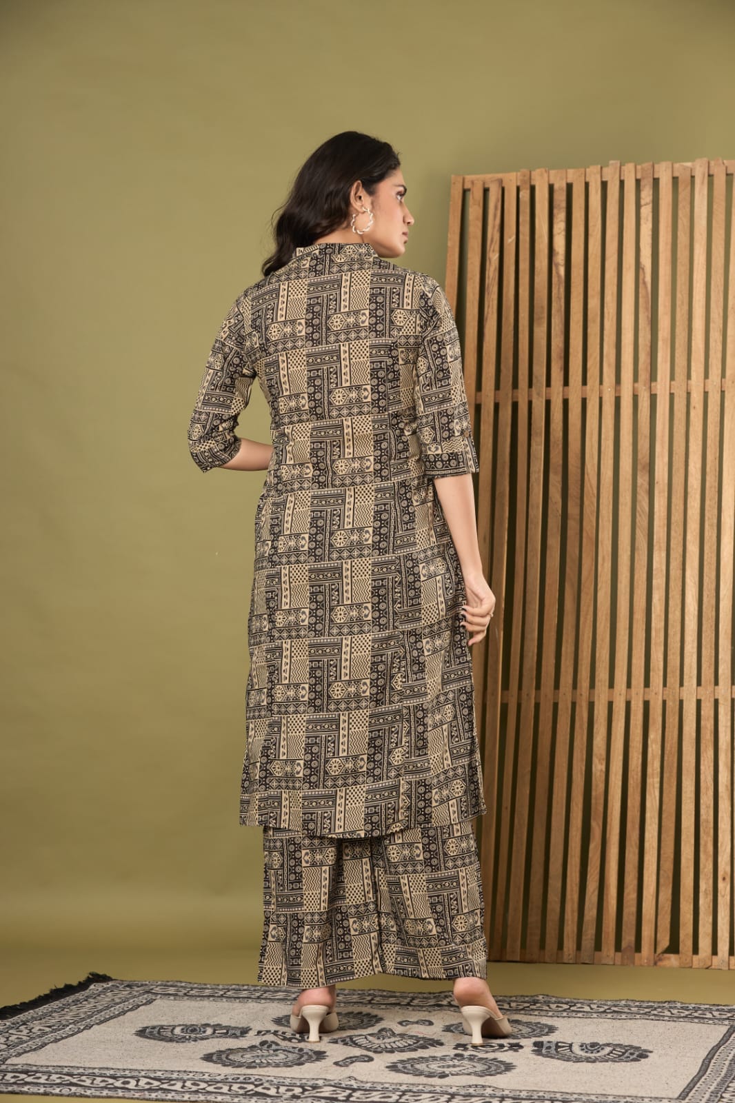 the kurti shop, women cotton kurta set, printed kurta pant set, kurta with pocket, black geometric print kurti, mandarin collar kurta set, office wear ethnic set, 3/4 sleeve straight kurti, ladies kurta pant set, traditional cotton dress, festive daily wear kurti, ethnic trousers combo set, ready to wear kurta pant
